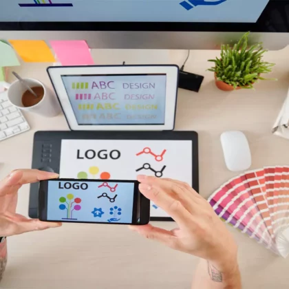 designer-photographing-logotype